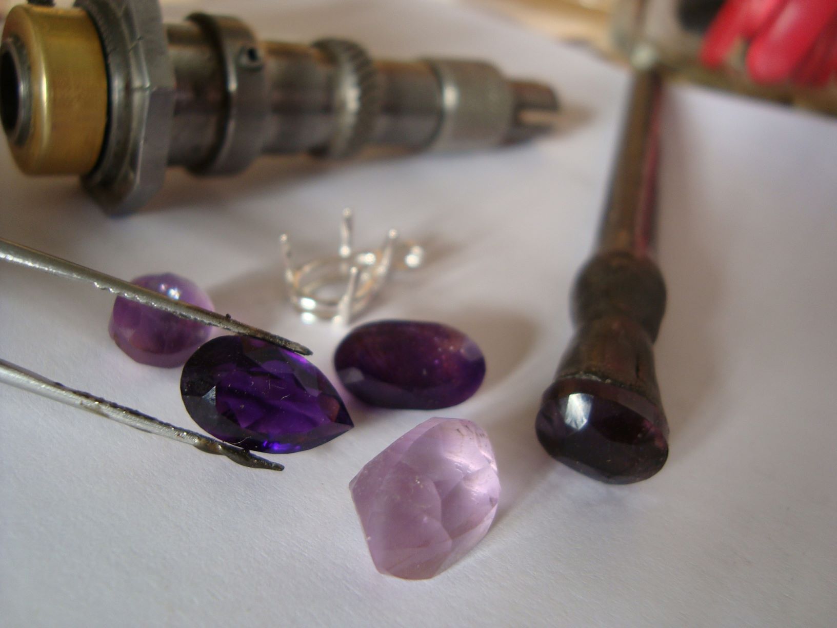 The lapidary’s work : faceting of amethyst gemstones.